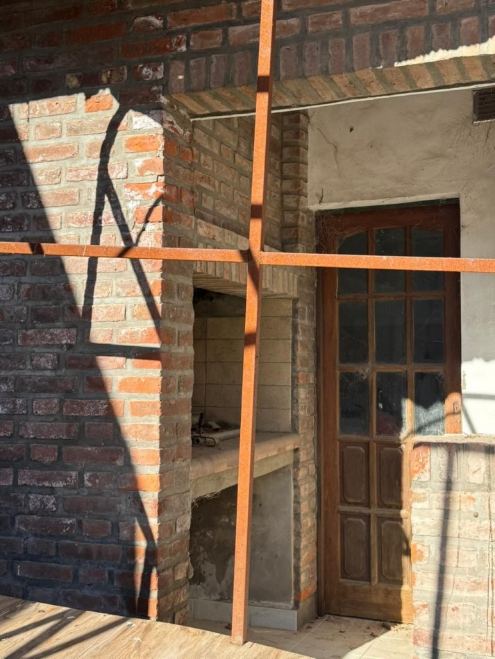 - VENTA TERRENO CON CONSTRUCCION-